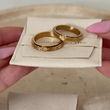gold spinning cross pattern ring